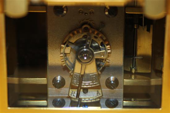 An Edwardian ormolu hour repeating carriage clock, 7in., with original travelling case